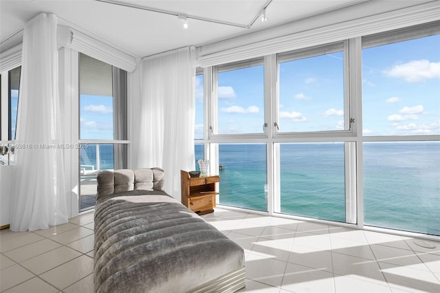 16485 Collins Ave Unit 1236-, Corner Unit Ocean, Sunny Isles Beach, FL 33160 - tiled bedroom with rail lighting and a water view