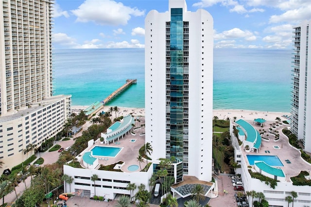 16485 Collins Ave Unit 1236-, Corner Unit Ocean, Sunny Isles Beach, FL 33160 - drone / aerial view of a pool area and a large body of water