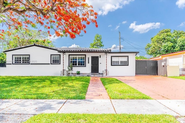 8000 SW 36th St, Miami, FL 33155 - view of front of house featuring stucco siding and a tile roof