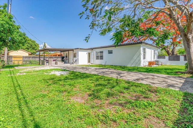 8000 SW 36th St, Miami, FL 33155 - rear view of property with stucco siding and a patio