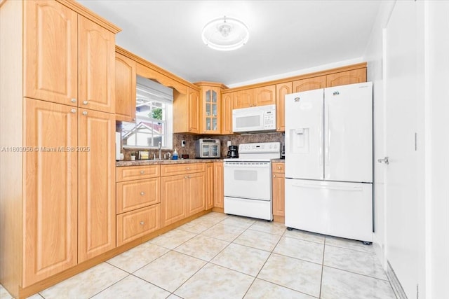 8000 SW 36th St, Miami, FL 33155 - kitchen featuring white appliances, glass insert cabinets, light tile patterned floors, decorative backsplash, and a sink