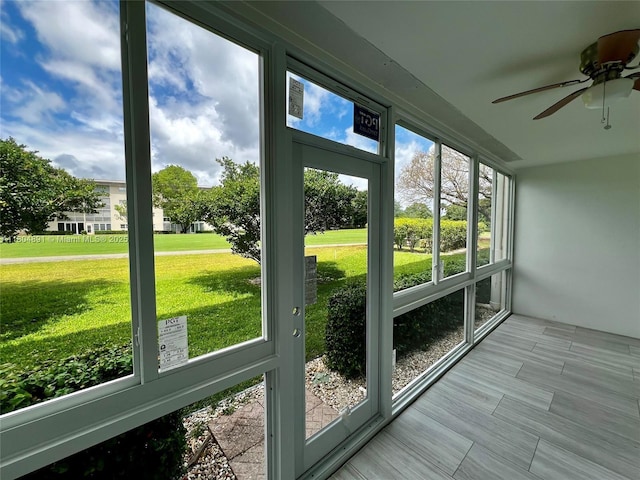 3401 Bimini Ln Unit E1, Coconut Creek, FL 33066 - unfurnished sunroom with ceiling fan
