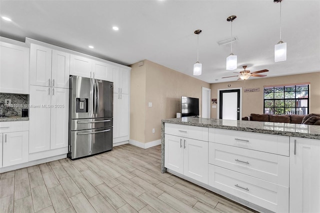 10350 SW 30th St, Miami, FL 33165 - kitchen featuring stainless steel fridge with ice dispenser, a ceiling fan, open floor plan, white cabinetry, and recessed lighting