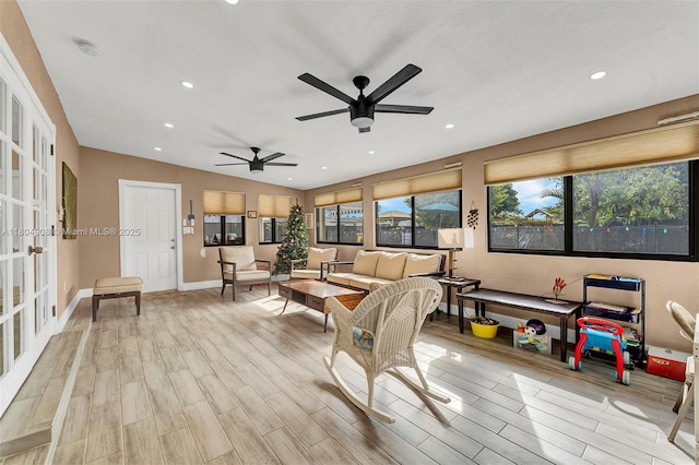 10350 SW 30th St, Miami, FL 33165 - living room with light wood-style flooring, ceiling fan, recessed lighting, lofted ceiling, and french doors