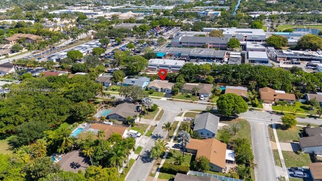 4955 NW 10th St, Coconut Creek, FL 33063 - aerial overview of property's location with nearby suburban area