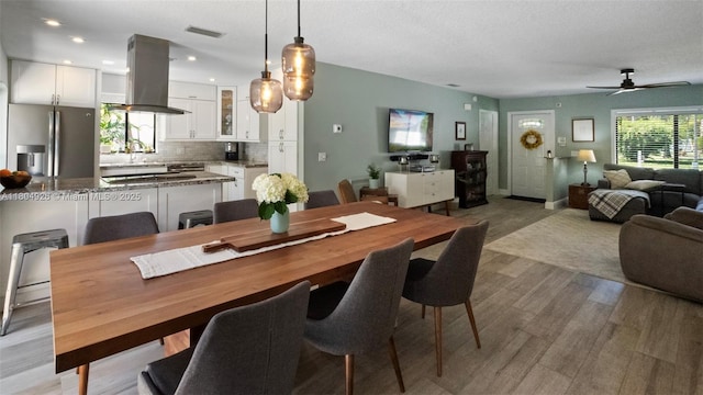 4955 NW 10th St, Coconut Creek, FL 33063 - dining area featuring light wood-type flooring, a ceiling fan, recessed lighting, and baseboards