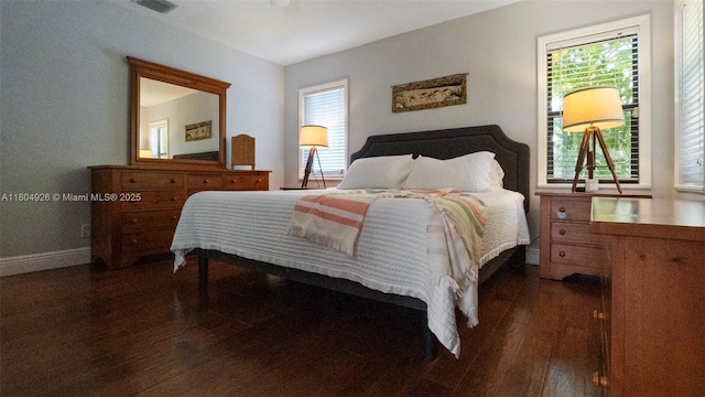 4955 NW 10th St, Coconut Creek, FL 33063 - bedroom with wood finished floors, multiple windows, and baseboards