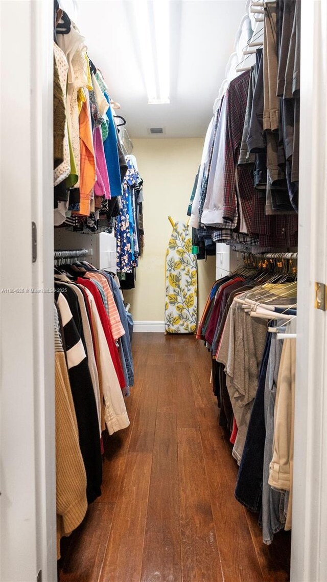 4955 NW 10th St, Coconut Creek, FL 33063 - walk in closet with wood-type flooring