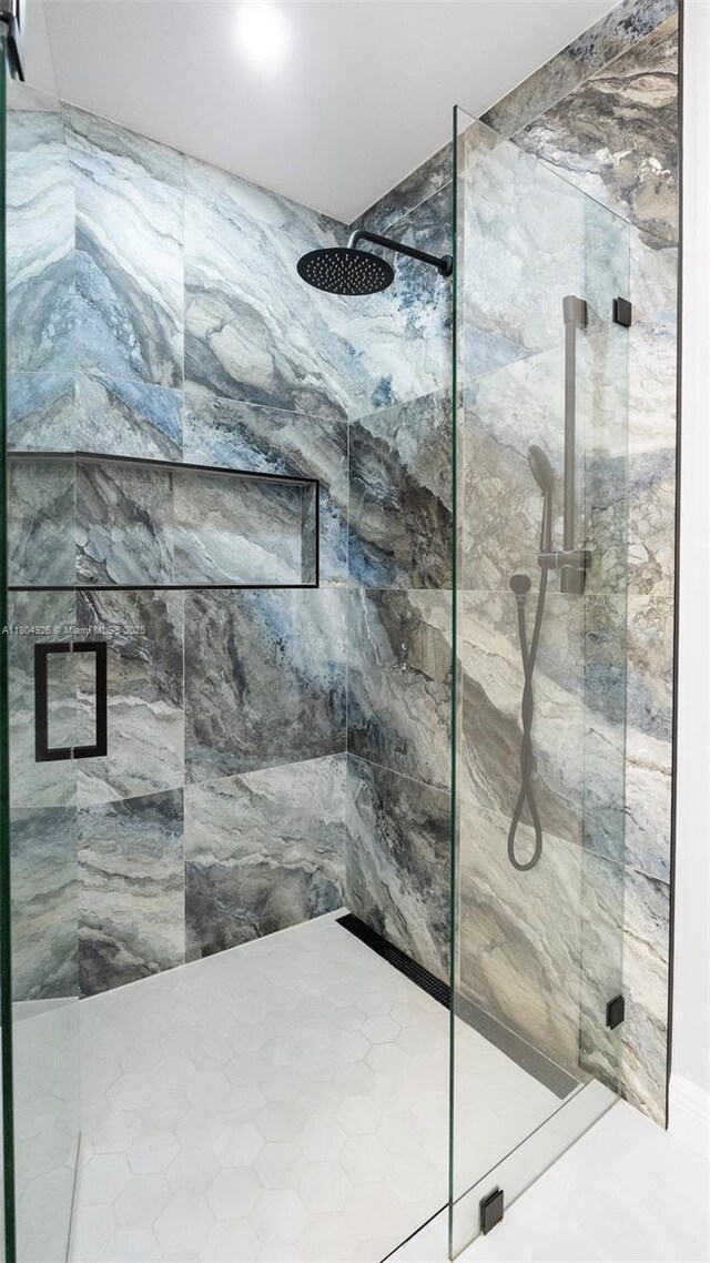 4955 NW 10th St, Coconut Creek, FL 33063 - bathroom featuring a marble finish shower