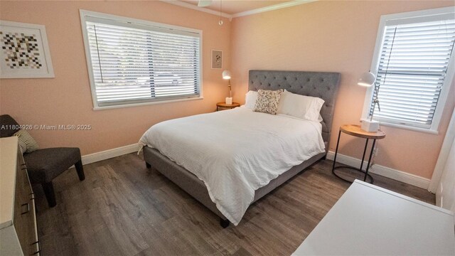 4955 NW 10th St, Coconut Creek, FL 33063 - bedroom featuring wood finished floors, crown molding, and baseboards
