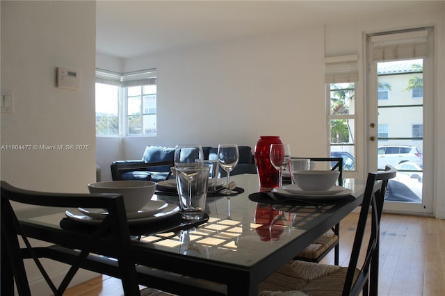 300 74th St Unit 10, Miami Beach, FL 33141 - dining area with hardwood / wood-style floors and french doors