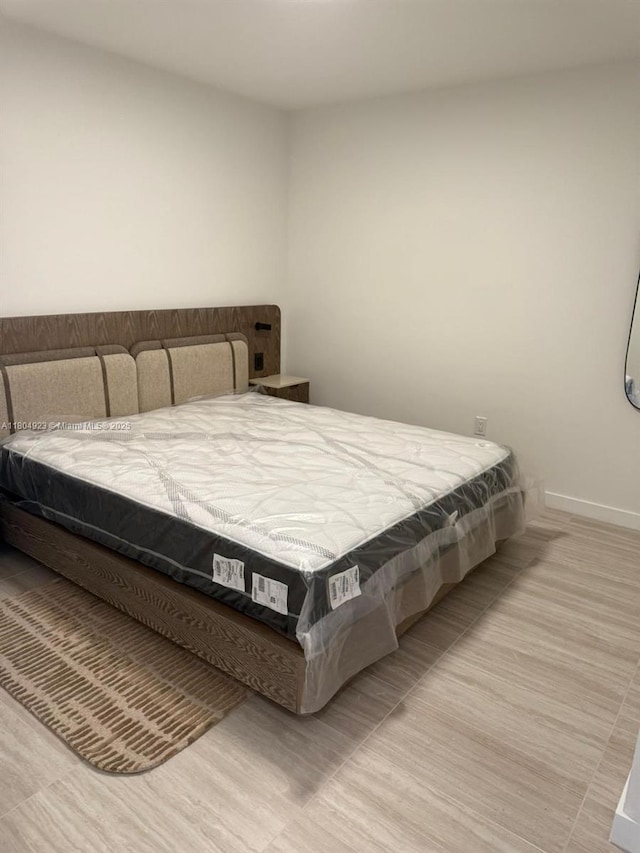 580 72 Unit Ph7, Miami Beach, FL 33141 - bedroom featuring baseboards
