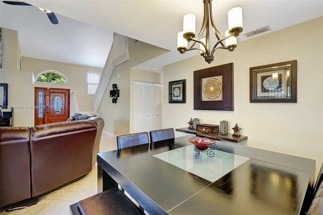 10920 SW 11th Ct, Davie, FL 33324 - dining room featuring light tile patterned floors, a chandelier, and a ceiling fan