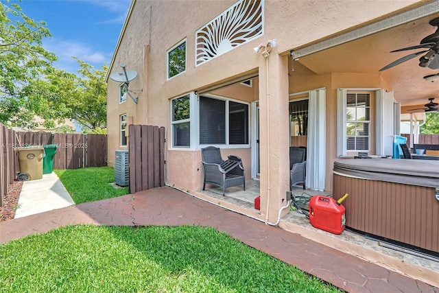 10920 SW 11th Ct, Davie, FL 33324 - view of patio with a hot tub, ceiling fan, and central air condition unit