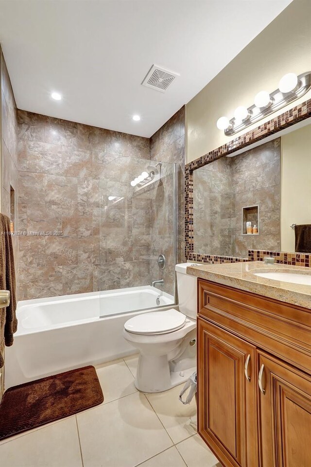 10920 SW 11th Ct, Davie, FL 33324 - full bath with toilet, washtub / shower combination, vanity, and tile patterned flooring