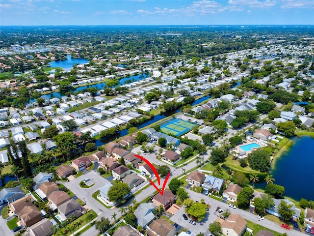 10920 SW 11th Ct, Davie, FL 33324 - aerial view of property and surrounding area featuring nearby suburban area and a large body of water
