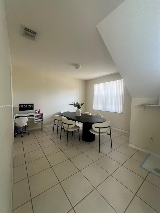 9942 SW 158th Ct, Miami, FL 33196 - dining area with light tile patterned flooring and baseboards