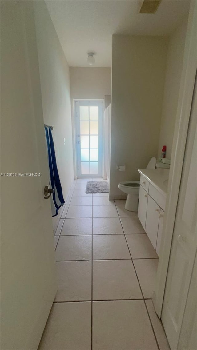 9942 SW 158th Ct, Miami, FL 33196 - full bathroom with tile patterned flooring, toilet, and vanity