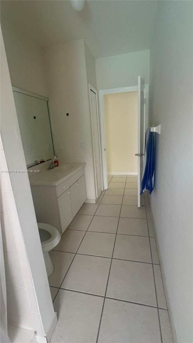 9942 SW 158th Ct, Miami, FL 33196 - bathroom with tile patterned flooring, vanity, and toilet