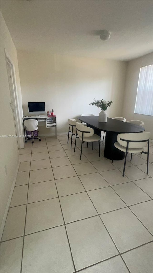 9942 SW 158th Ct, Miami, FL 33196 - dining space with light tile patterned floors and baseboards