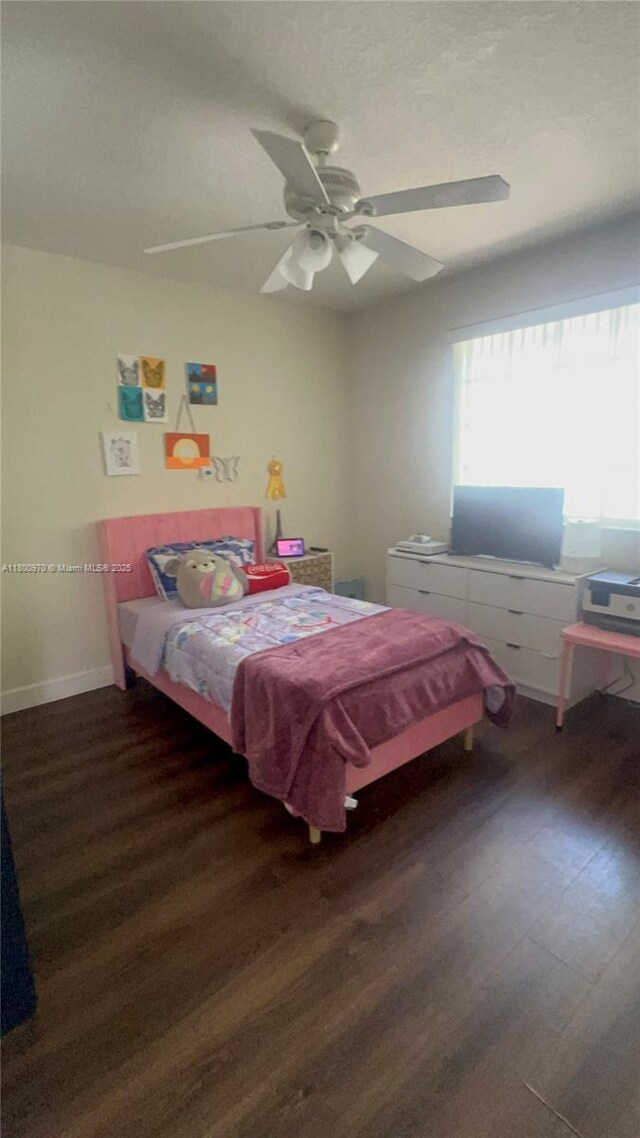 9942 SW 158th Ct, Miami, FL 33196 - bedroom with wood finished floors, a ceiling fan, and a textured ceiling