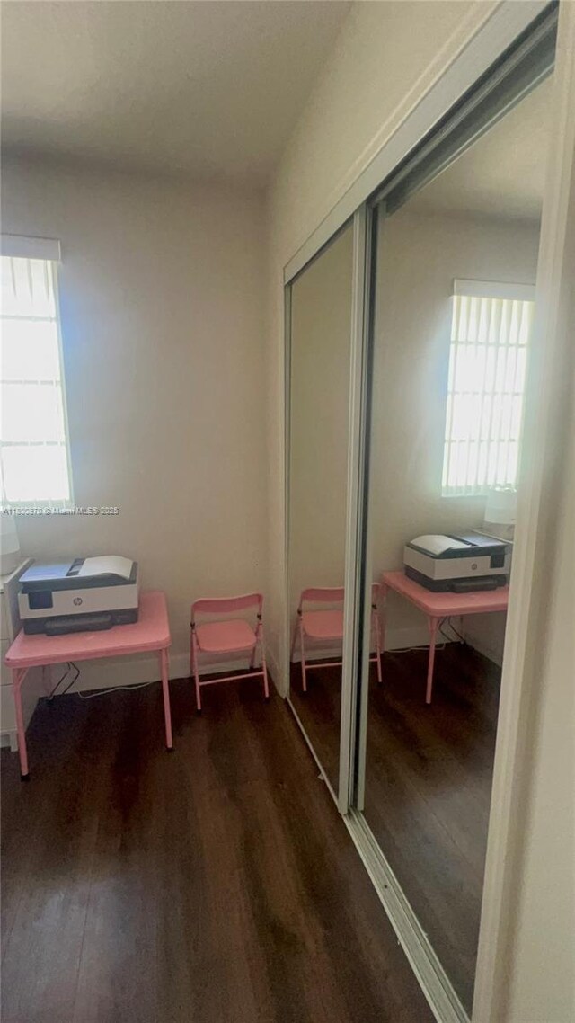 9942 SW 158th Ct, Miami, FL 33196 - interior space with wood finished floors and healthy amount of natural light