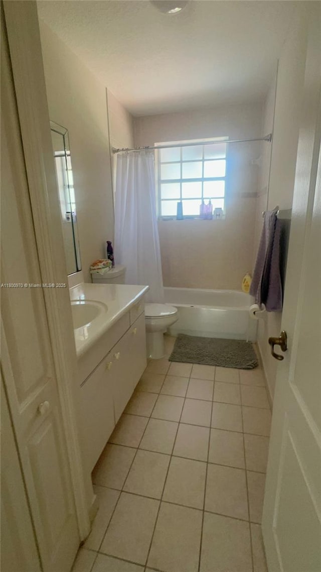 9942 SW 158th Ct, Miami, FL 33196 - full bath featuring tile patterned flooring, toilet, vanity, and shower / bath combo