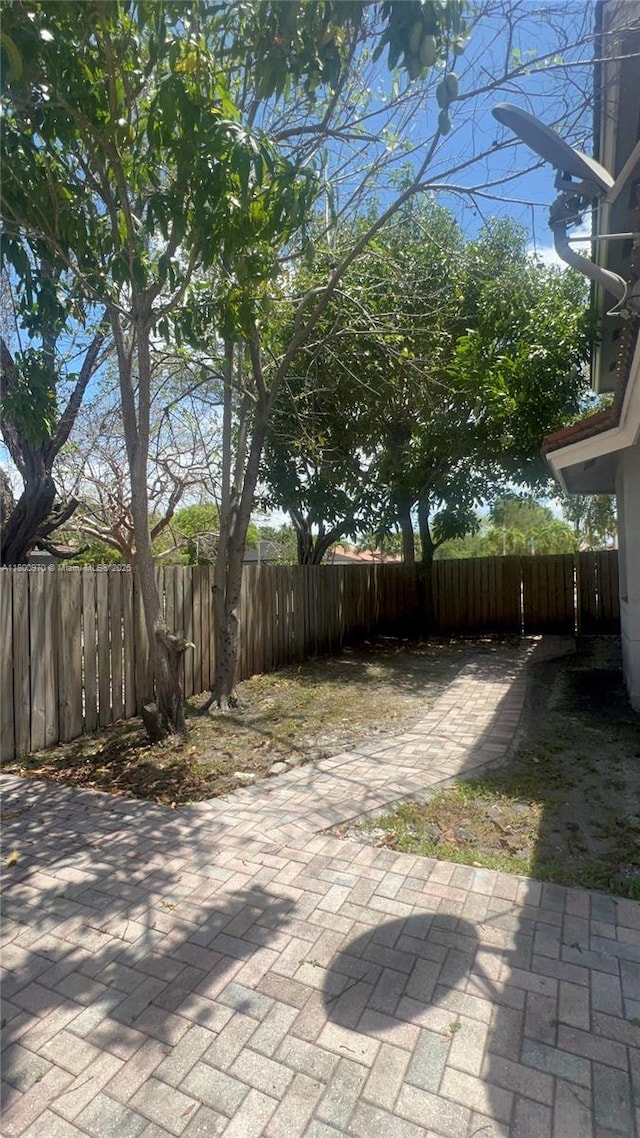 9942 SW 158th Ct, Miami, FL 33196 - fenced yard with a patio