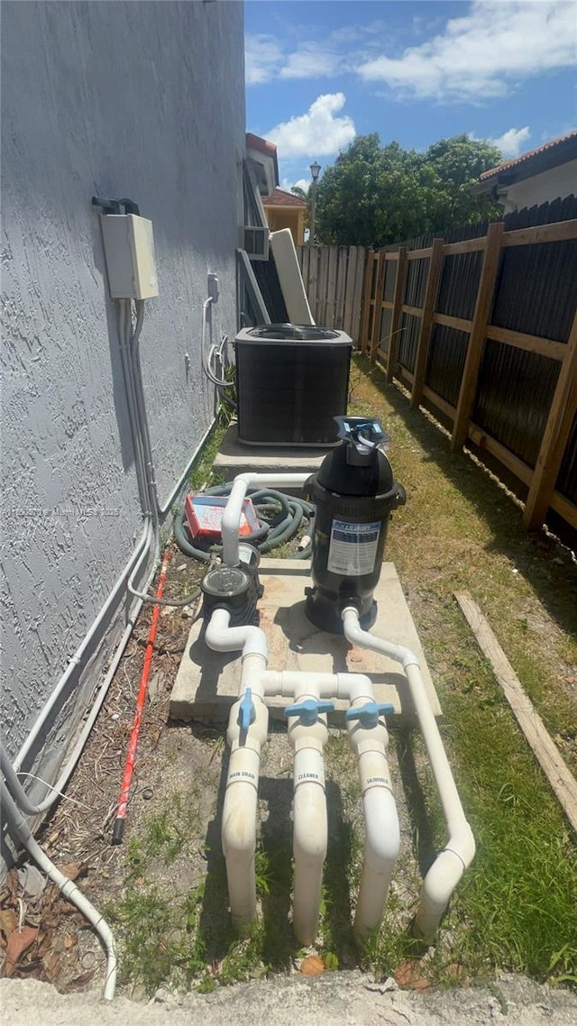 9942 SW 158th Ct, Miami, FL 33196 - view of yard featuring fence and central AC