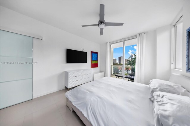 3030 NE 188th St Unit 602, Aventura, FL 33180 - bedroom featuring ceiling fan and baseboards
