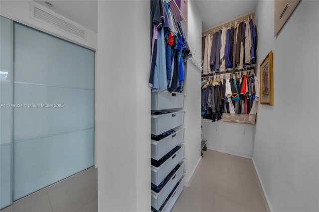 3030 NE 188th St Unit 602, Aventura, FL 33180 - spacious closet featuring tile patterned flooring