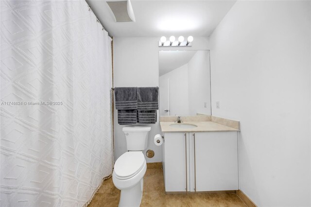3030 NE 188th St Unit 602, Aventura, FL 33180 - bathroom with toilet, vanity, baseboards, curtained shower, and tile patterned flooring