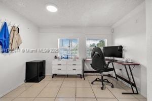 3275 NW 95th St, Miami, FL 33147 - home office featuring tile patterned flooring