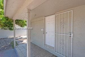 3275 NW 95th St, Miami, FL 33147 - view of exterior entry with stucco siding