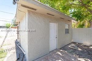 3275 NW 95th St, Miami, FL 33147 - view of outdoor structure featuring fence