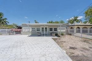 3275 NW 95th St, Miami, FL 33147 - back of property with fence
