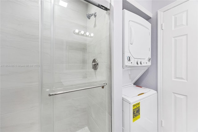 3639 NW 83rd Ln, Sunrise, FL 33351 - bathroom featuring estacked washer and dryer and a shower stall