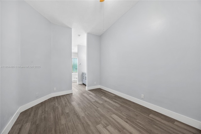 3639 NW 83rd Ln, Sunrise, FL 33351 - spare room with dark wood finished floors and baseboards