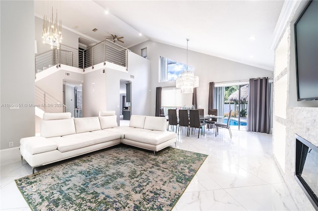 18201 NW 16th St, Pembroke Pines, FL 33029 - living area with a chandelier, marble finish flooring, crown molding, a ceiling fan, and high vaulted ceiling