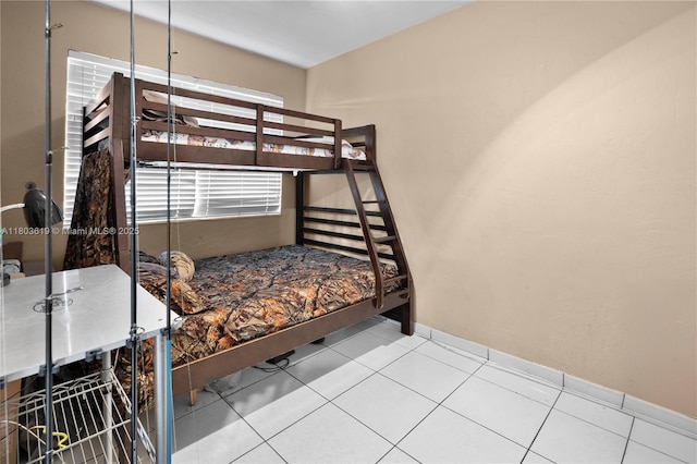 9210 SW 41st St, Miami, FL 33165 - bedroom featuring tile patterned floors and baseboards