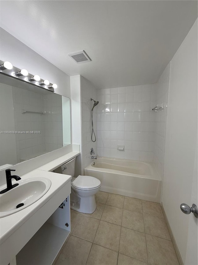 616 Clearwater Park Rd Unit 212, West Palm Beach, FL 33401 - bathroom with tile patterned flooring, toilet, tub / shower combination, and vanity