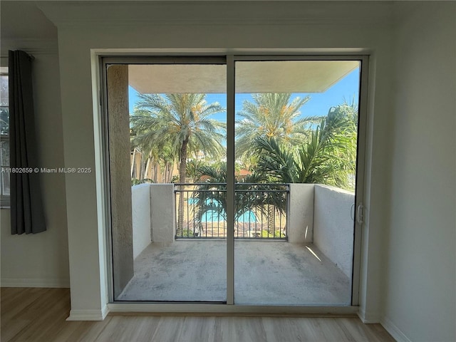 616 Clearwater Park Rd Unit 212, West Palm Beach, FL 33401 - entryway featuring wood finished floors, baseboards, and plenty of natural light