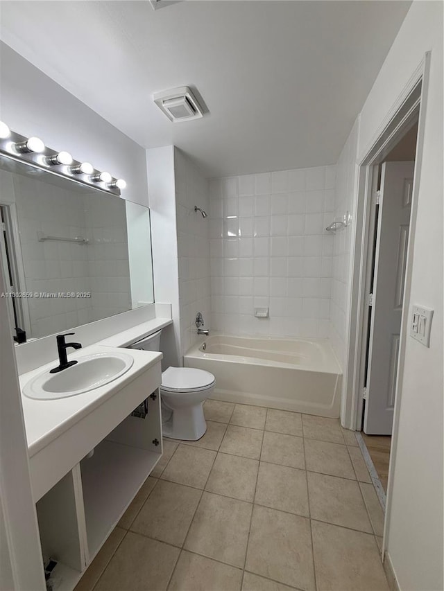 616 Clearwater Park Rd Unit 212, West Palm Beach, FL 33401 - bathroom featuring tile patterned flooring, shower / tub combination, toilet, and vanity