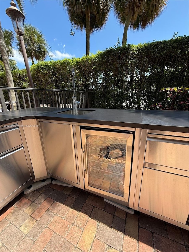 616 Clearwater Park Rd Unit 212, West Palm Beach, FL 33401 - exterior view of beverage cooler and a sink