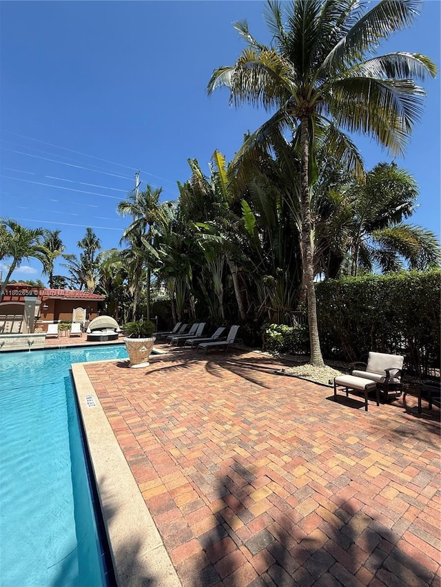 616 Clearwater Park Rd Unit 212, West Palm Beach, FL 33401 - community pool with a patio
