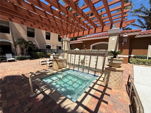 616 Clearwater Park Rd Unit 212, West Palm Beach, FL 33401 - view of pool featuring a pergola, a community hot tub, and a patio