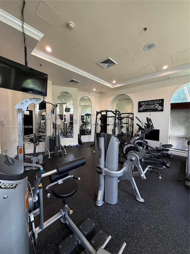 616 Clearwater Park Rd Unit 212, West Palm Beach, FL 33401 - gym with crown molding, recessed lighting, and arched walkways