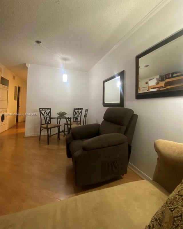 4691 NW 9th St Unit A209, Miami, FL 33126 - living area with a textured ceiling and wood finished floors