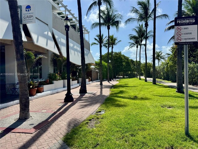 65 Washington Ave Unit 3, Miami Beach, FL 33139 - surrounding community with a lawn
