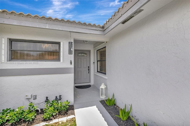 11955 Brim Way, Cooper City, FL 33026 - doorway to property with stucco siding